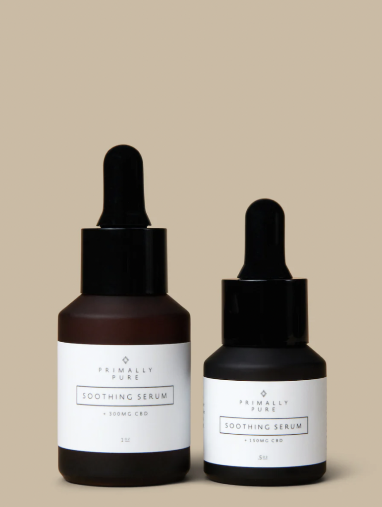 Two Primally Pure Soothing Serum CBD amber bottles with a neutral backdrop